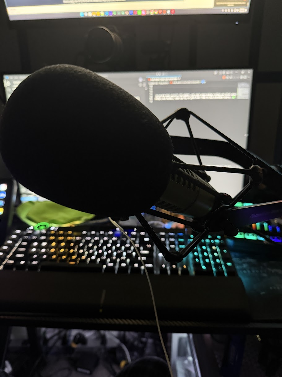 Electro-Voice RE20 review desk setup: RE20 on a boom arm next to a GoXLR